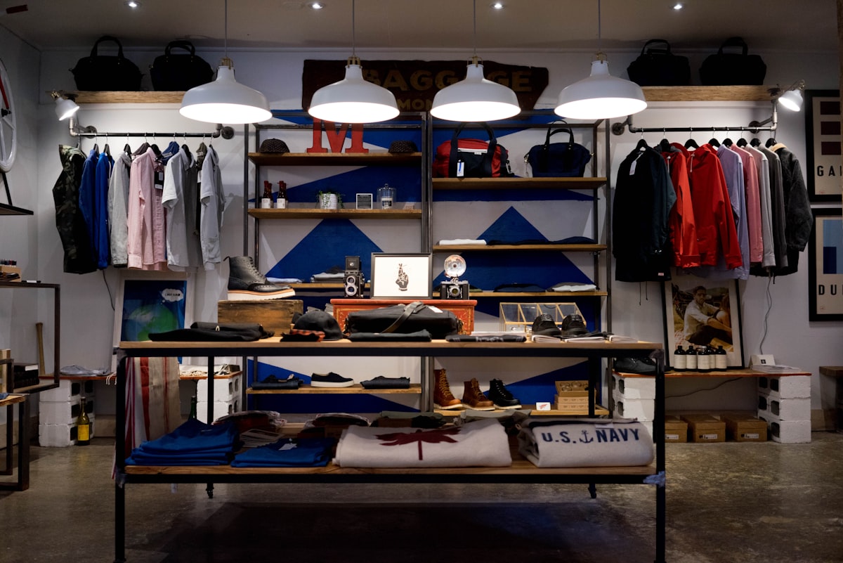 Bright retail shop floor with clothing racks